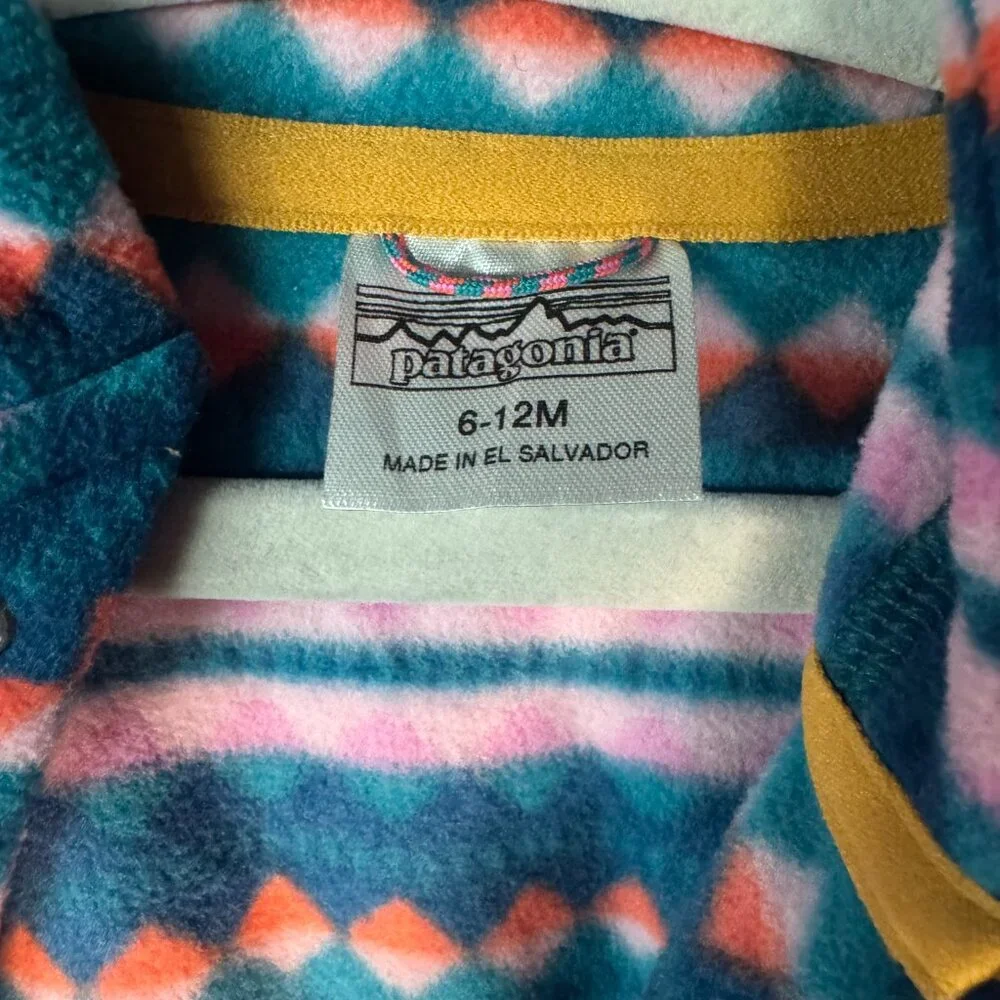 Patagonia Kids Footed One-Piece Fleece Romper in Teal, Pink & Orange Geo Print